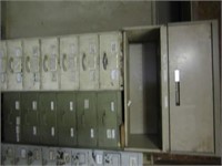 2 metal drawer cabinets filled with various bolts.