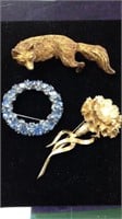 One Boucher carnation flower gold tone brooch,