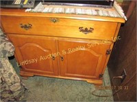 Wooden rolling enclosed bar cabinet w/ wine