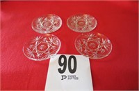 6 small glass saucers.