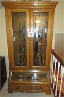 10 Gun oak gun cabinet, 77" tall, 38 " wide, Has