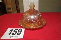 Old amber color butter dish.