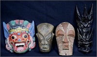 MIXED LOT OF FOUR WOOD CARVED MASKS