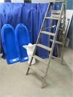 old step ladder -2 plastic sleds -plaster angel
