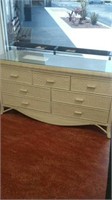 White wooden and wicker glass top 7 drawer dresser