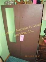 Brown metal 2 door wardrobe cabinet w/ mirror on