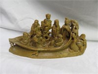 CARVED SOAPSTONE FIGURES ON BOAT 4"T X 8"W