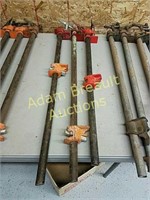 Three 30 inch pipe wood clamps