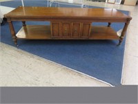 MAHOGANY CROSS BANDED COFFEE TABLE ON CASTERS