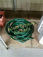 Two 25 foot garden hoses