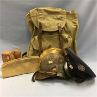 Military accessories: backpack, helmet, hat, leath