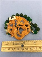 Jade bead brecelet with a 2.5" carved jade pendant