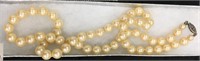 Faux pearl necklace        (2)