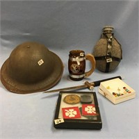 Lot with old military memorabilia: felt covered ca