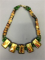 Necklace with assorted religious scenes