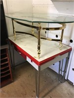 Retro style metal desk and an oval glass top coffe