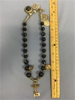 Beautiful necklace with many religious medals