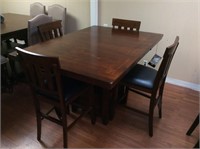 Ashley 594 counter height table and 4 barstools