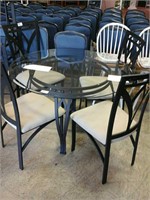 Round glass top/ black metal table w 4 cushioned
