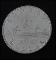 1962 CAD Silver Dollar  - Fineness:.800