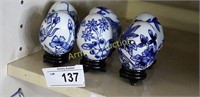 BLUE AND WHITE DECORATIVE EGGS ON STANDS