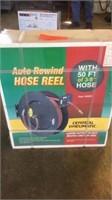 Auto rewind hose reel and hose