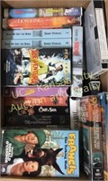 Assorted VHS Tapes and Books