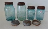 (4) Various size antique blue Ball jars with