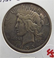 1935-S Peace silver dollar. (Better date).