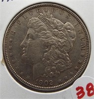 1902 Morgan silver dollar.