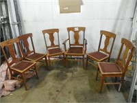 6 Oak chairs with 1 being captain chair