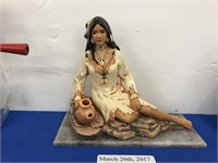 CERAMIC SCULPTURE OF A NATIVE AMERICAN WOMAN LYING