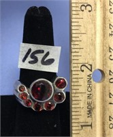 Choice on 2 (156-157): sterling silver and garnet