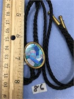 Bolo tie with inset opal and has unreadable hallma
