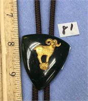 Beautiful bolo tie jade with dahl sheep on a gold