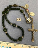 Jade necklace with crucifix and religious medals a