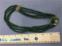 Approximately 18" four-stranded jade bead necklace