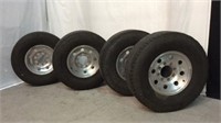 Four Aluminum Rims W/ Tires - S11