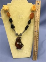 Necklace made out of amber, amber pendant made fro