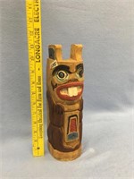 11" carved totem with abalone eyes - imported