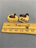 2 Canadian geese on bone nests, with 2 ivory eggs