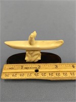3" Kayaker mounted on a hardwood base, carved from