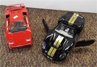 (2) Die cast metal cars including Burago