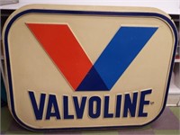Vintage plastic Valvoline sign. Measures 50.5" x