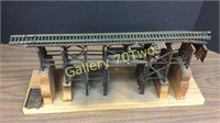 Wood display for train rail on top of scaffolding