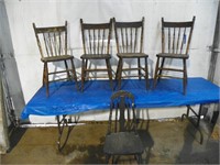 Believed to be 4 carved back chairs and one black