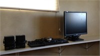 Computer monitor, speakers, mouse and keyboard