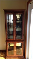 Curio cabinet, 72 inches high, 28 inches wide, in