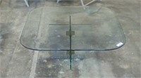 Glass coffee table approximately 16" X 37-1/4"