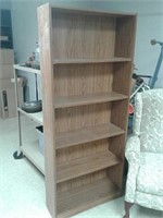 5 shelf particle board bookcase. Some damage as